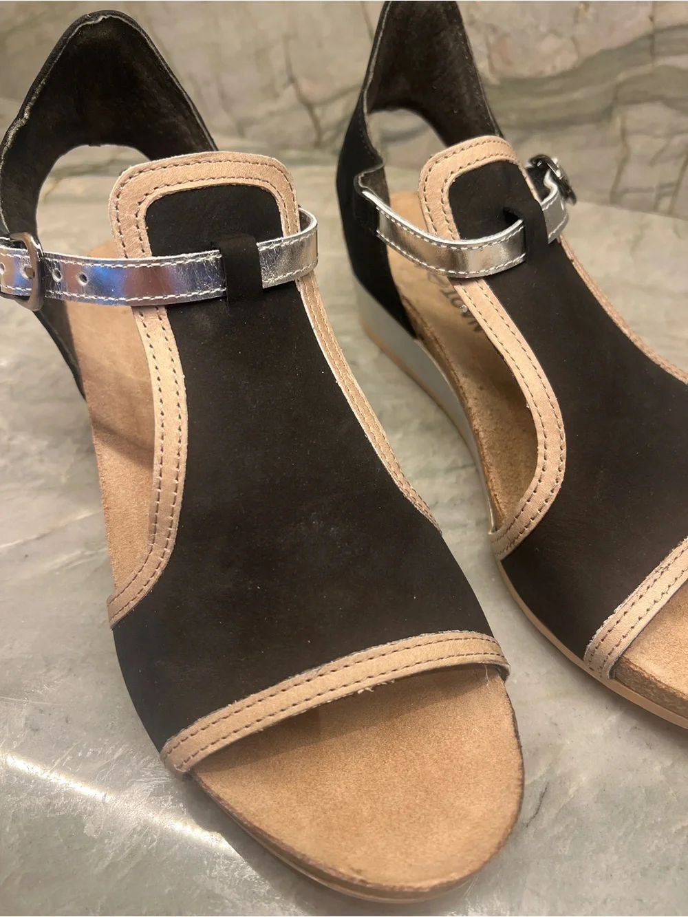 Naot Black Sandals with Beige Trim and Metallic Buckle